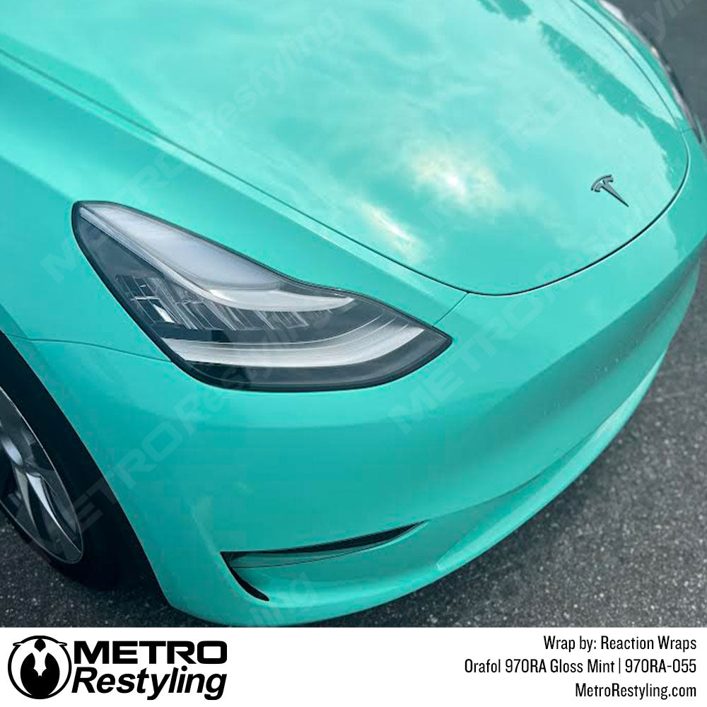 Tiffany blue vinyl wrapped tesla