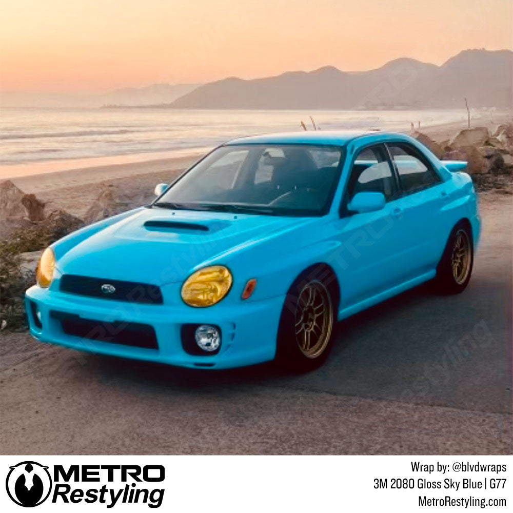 subaru with blue wrap