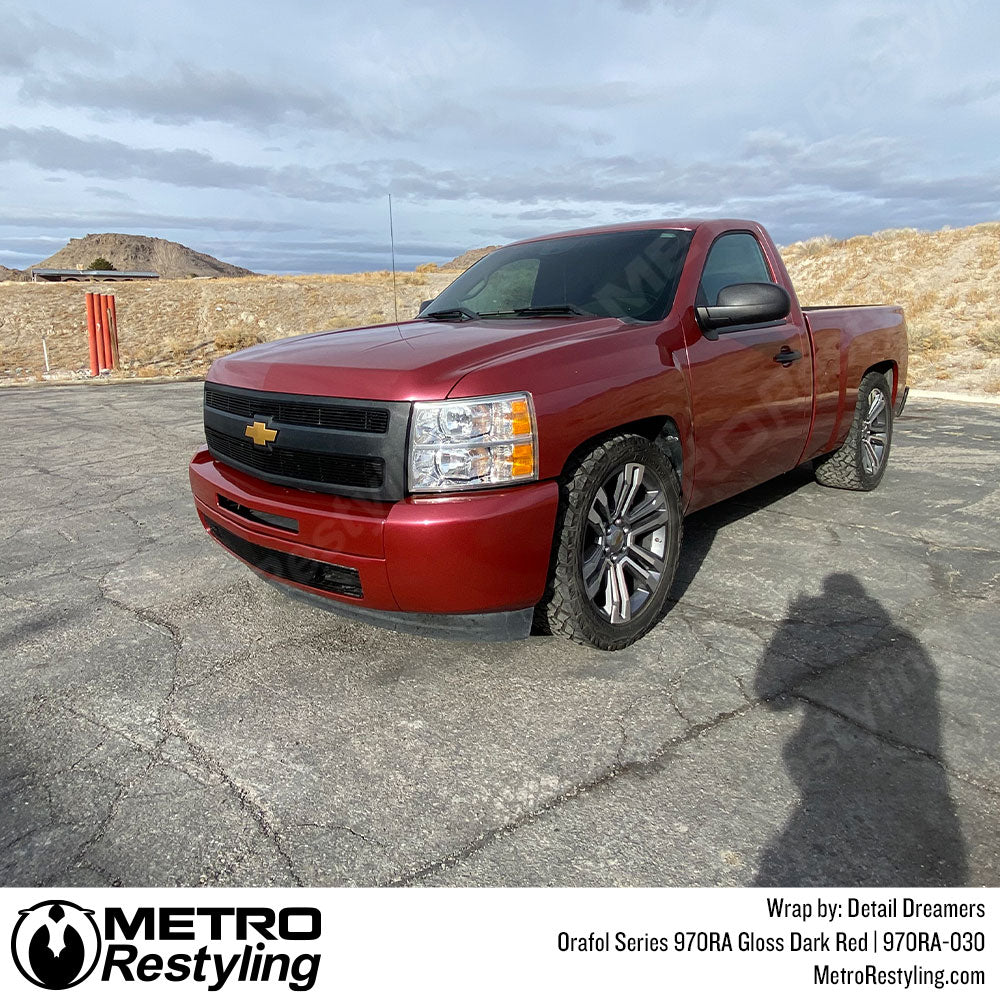 red vinyl truck wrap