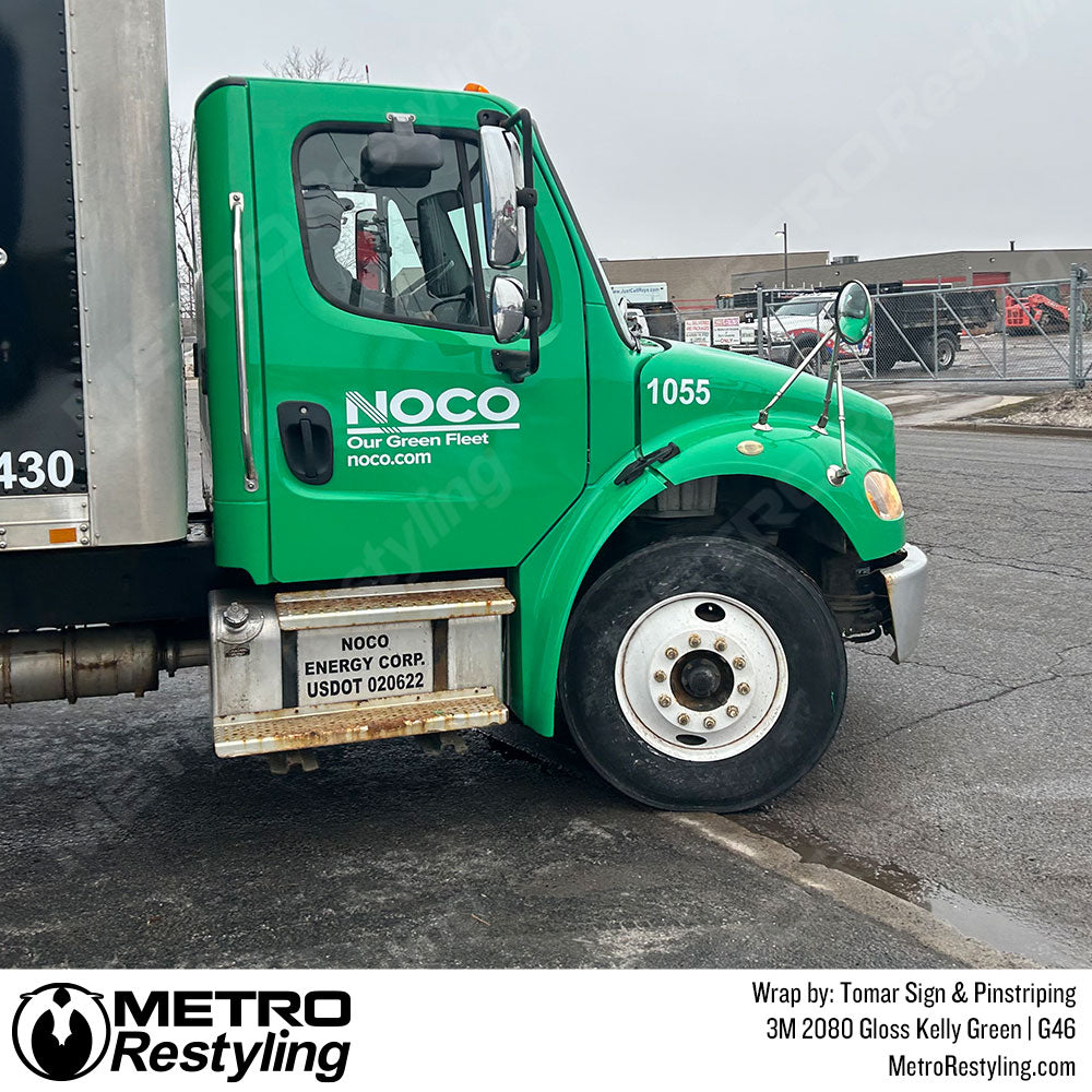 Wrapped green box truck