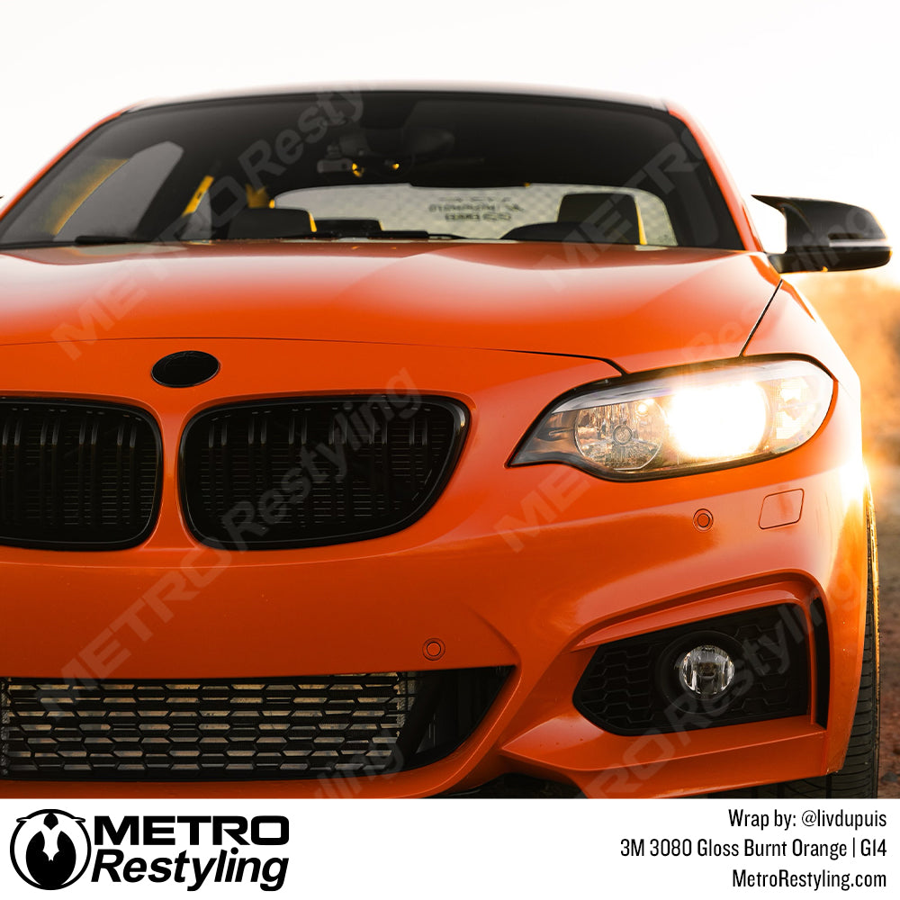 Gloss orange bmw vinyl wrap
