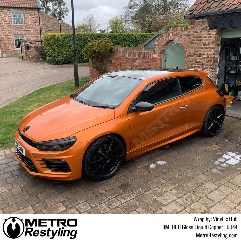 orange volkswagen vinyl wrap