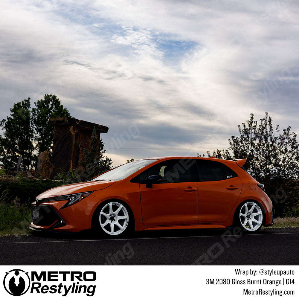 bright orange toyota vinyl wrap