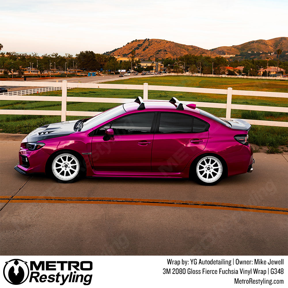 gloss fierce fuchsia vinyl wrap on subaru