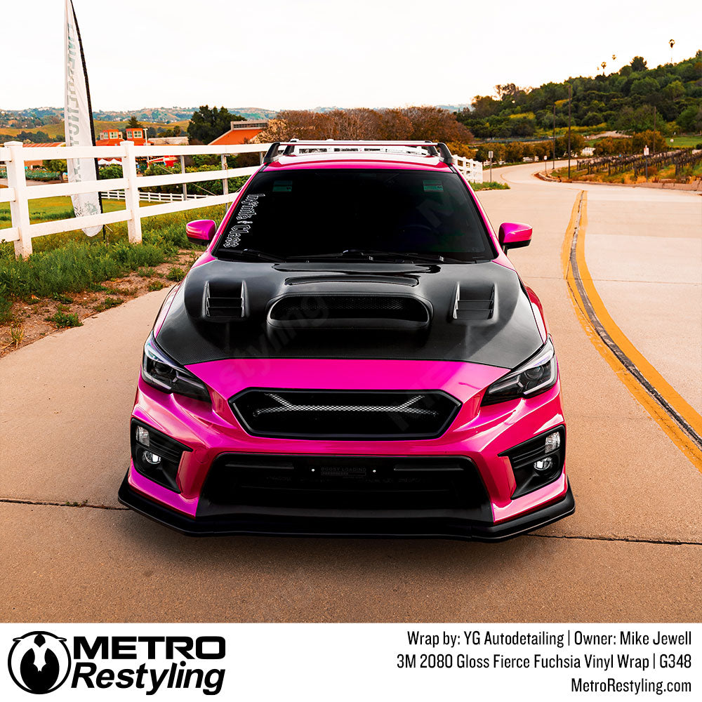 gloss fierce fuchsia vinyl wrap on subaru