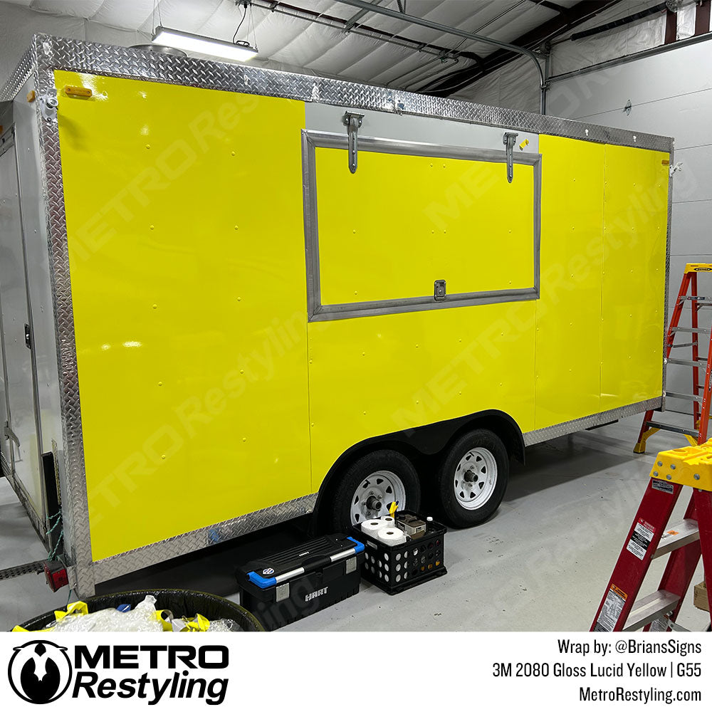 yellow food trailer wrap