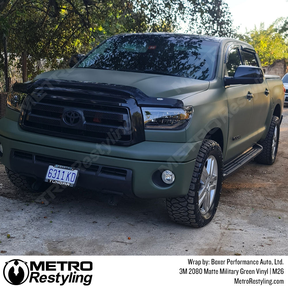 truck wrapped with military green
