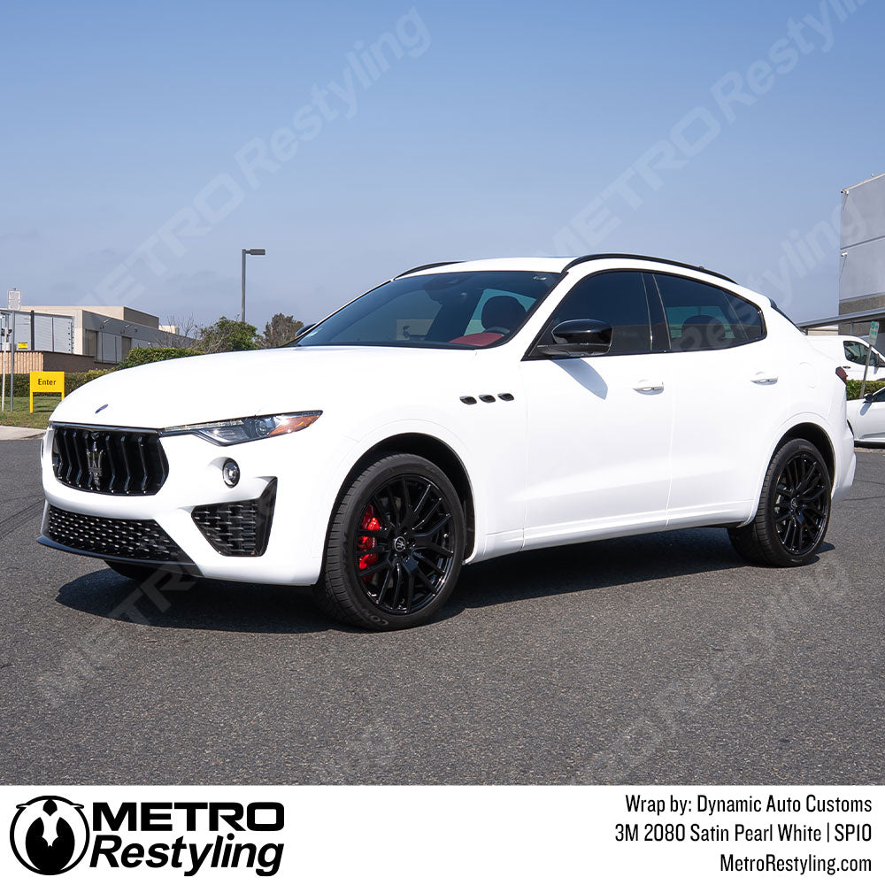 white maserati ghibli wrap