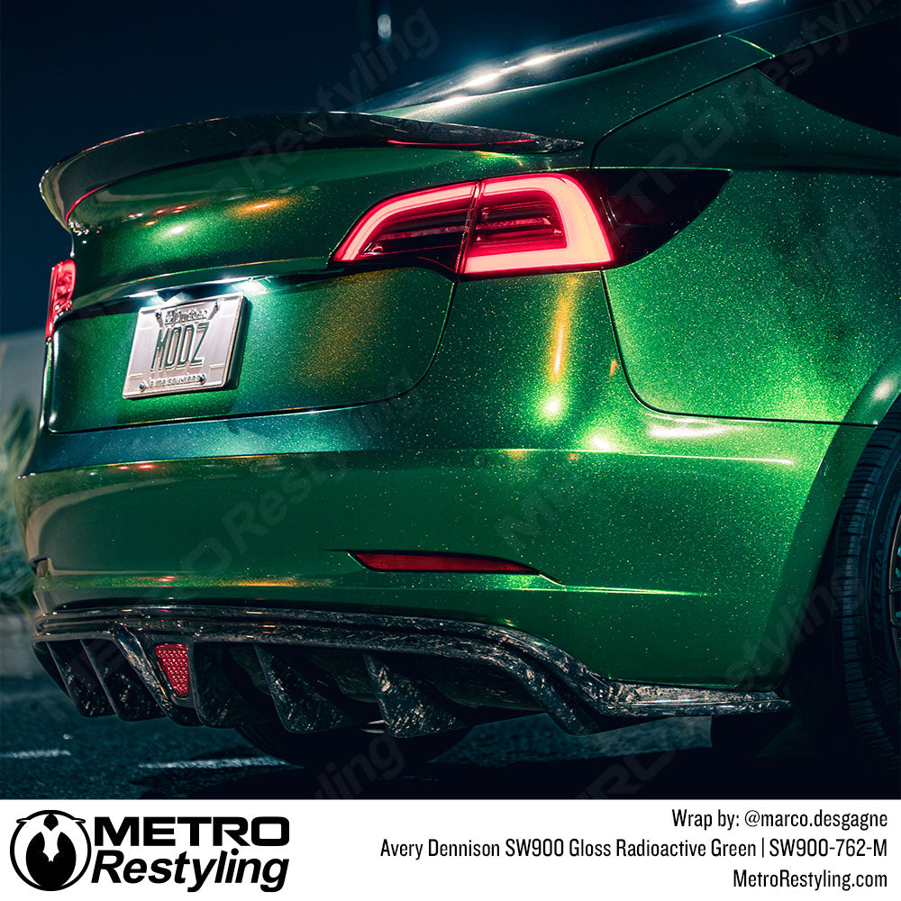 tesla with green wrap
