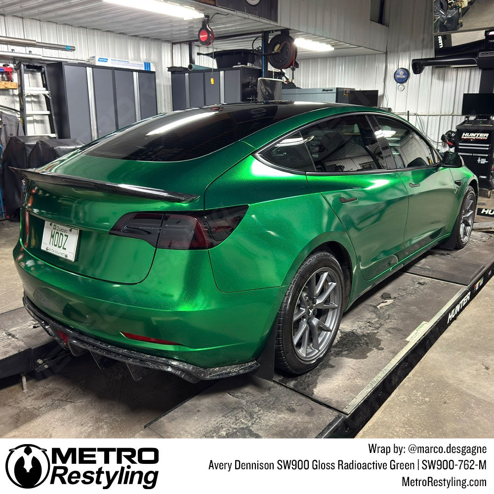 tesla with green wrap