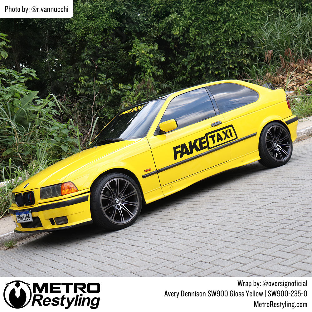 BMW with yellow car vinyl wrap