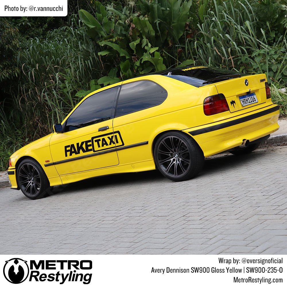 BMW with yellow car vinyl wrap