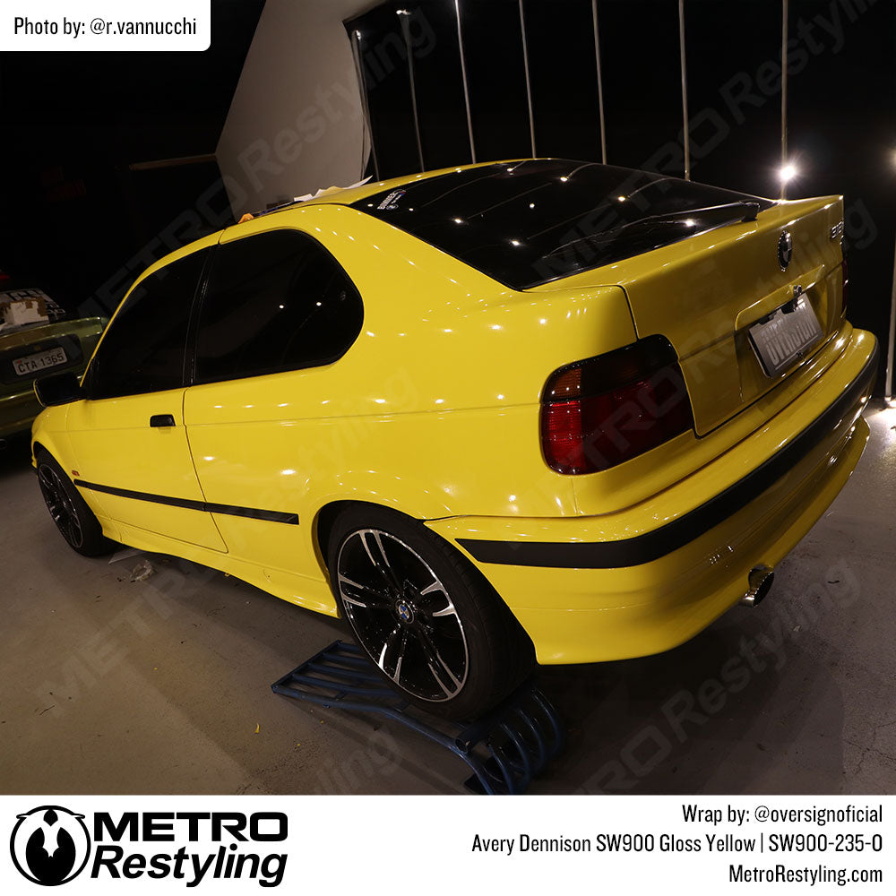 BMW with yellow car vinyl wrap