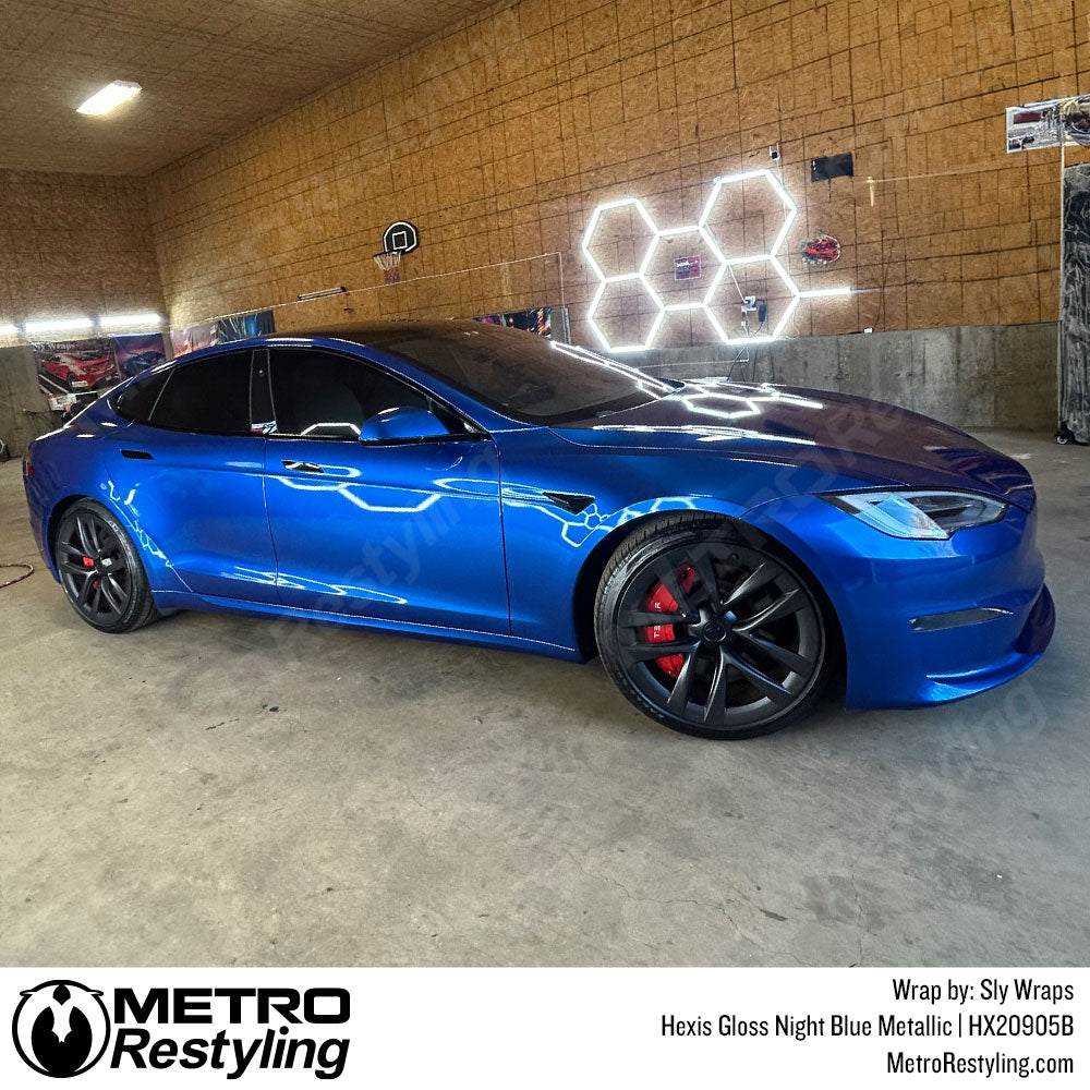 tesla with metallic blue wrap