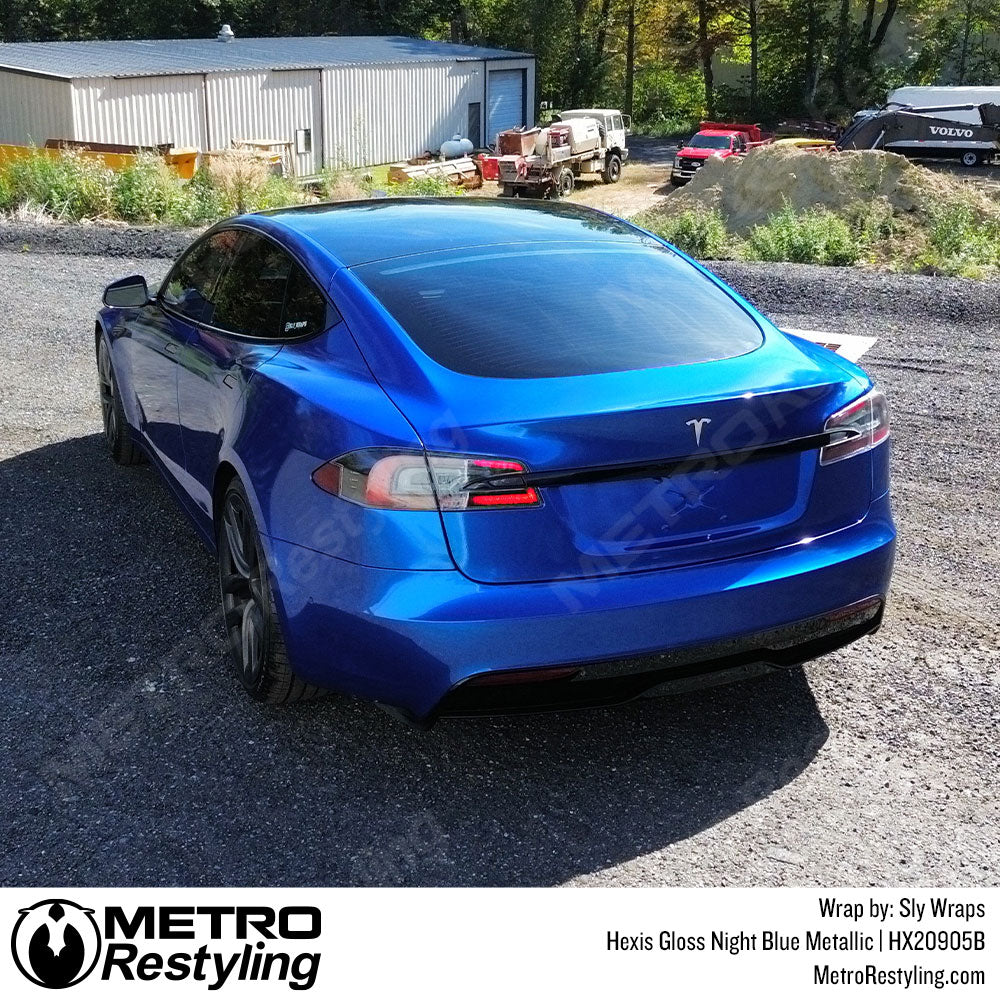 tesla with metallic blue wrap