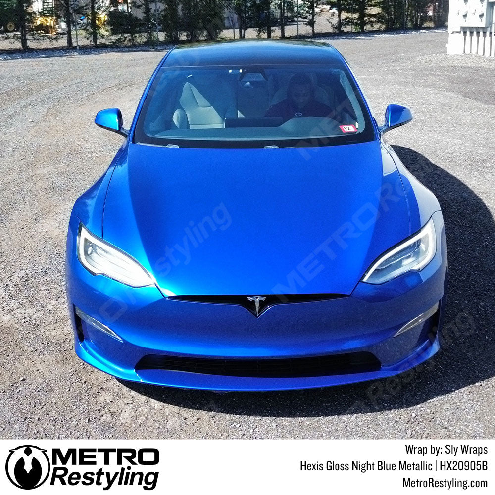 tesla with metallic blue wrap
