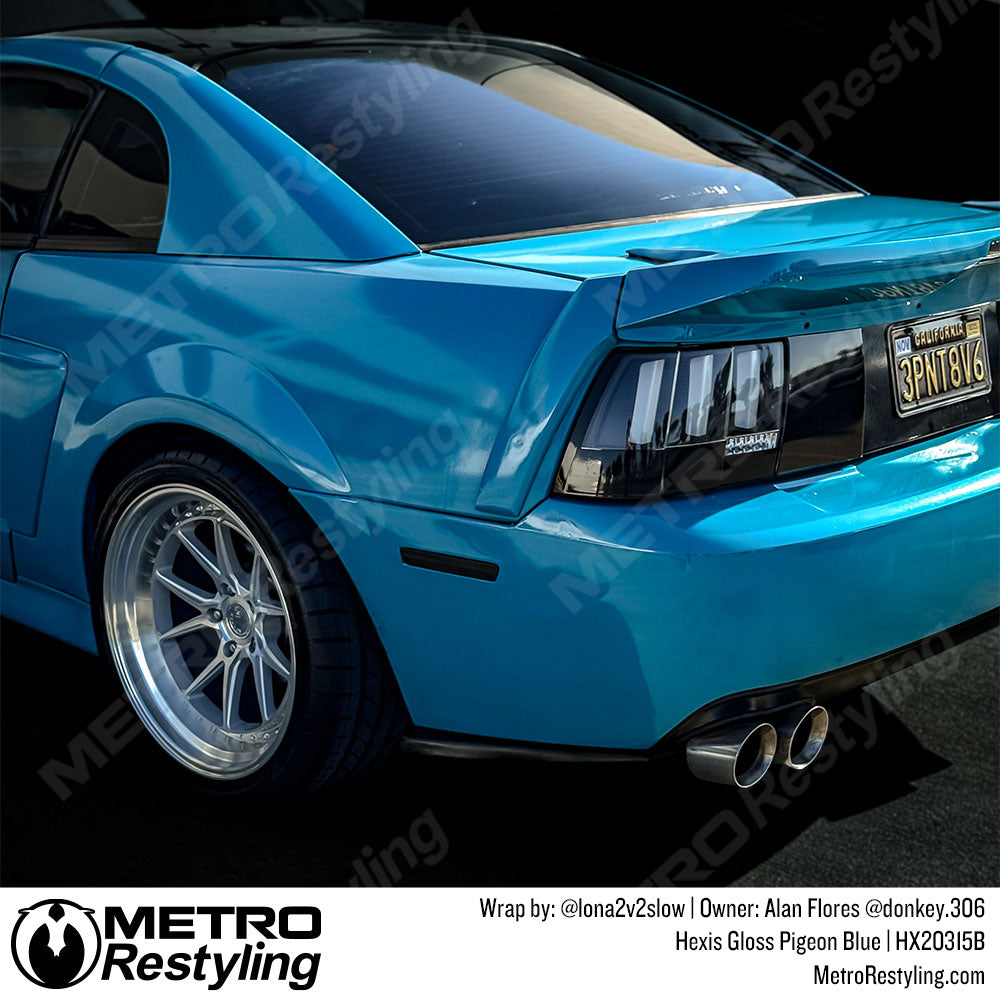 glossy blue ford mustang wrap
