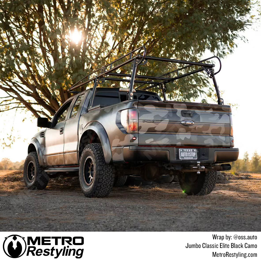 black camo truck wrap
