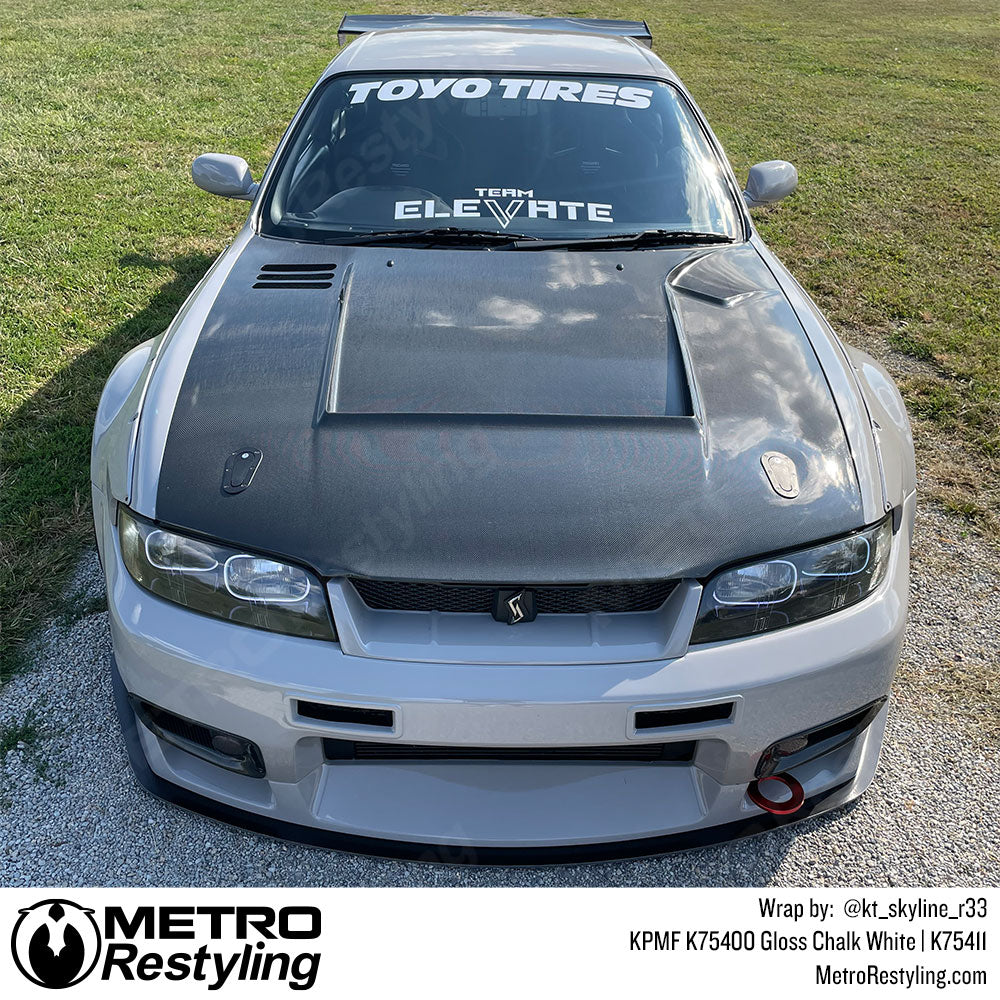 nissan car with white wrap