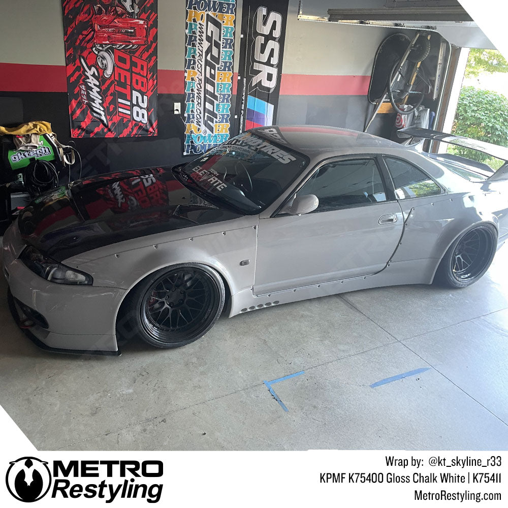 nissan car with white wrap