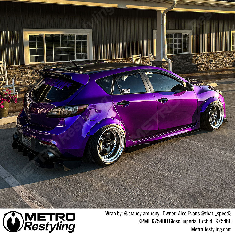 mazda with purple wrap