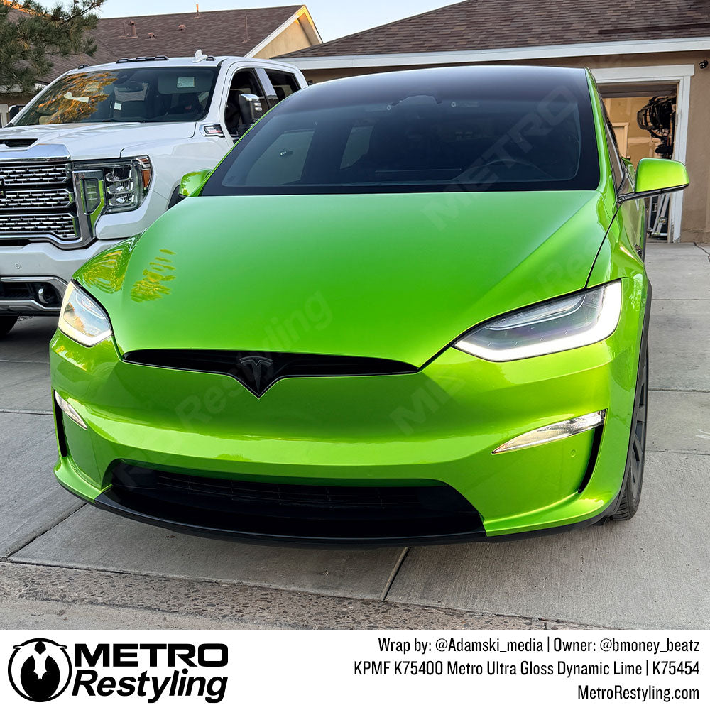 tesla with bright green wrap
