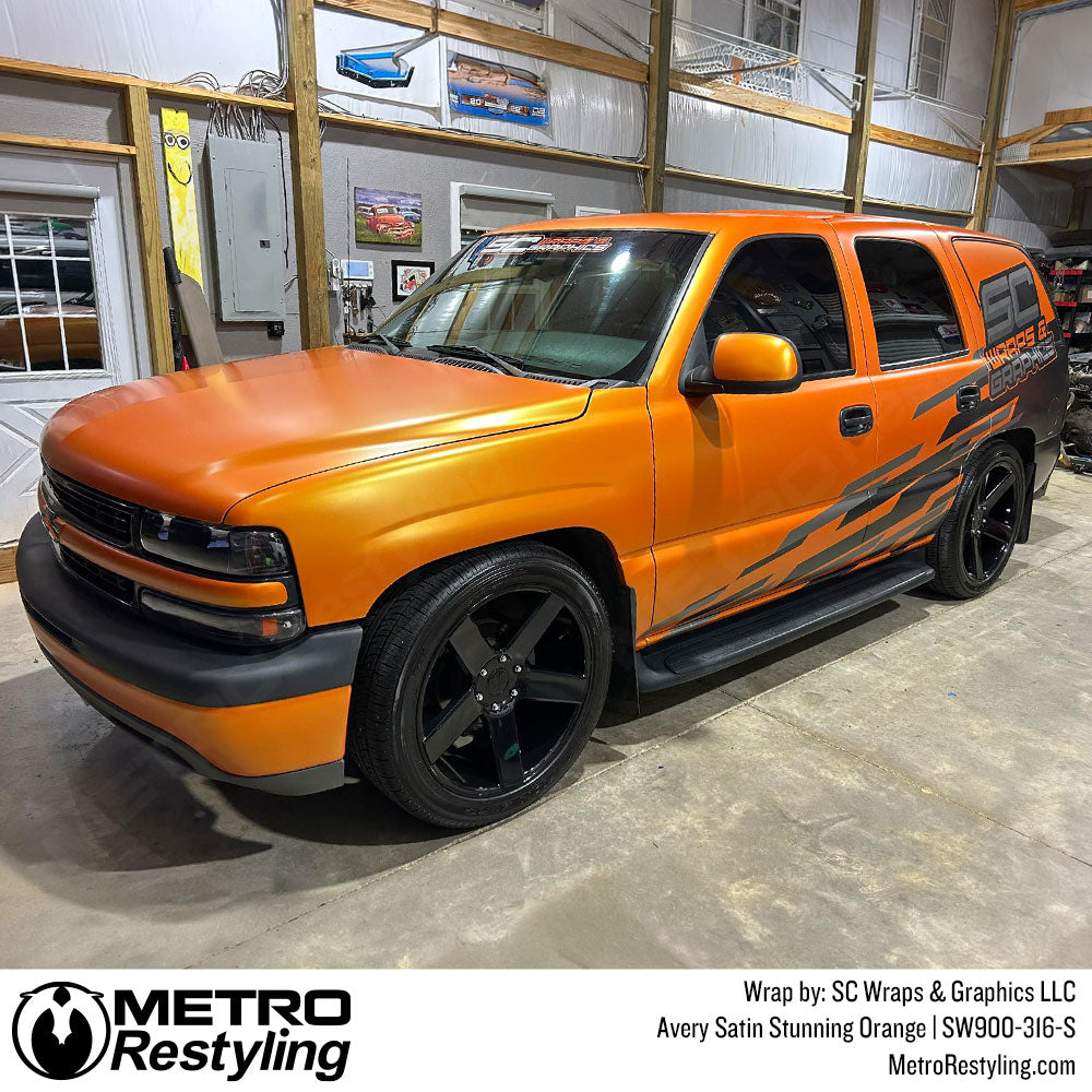 chevy tahoe with orange wrap