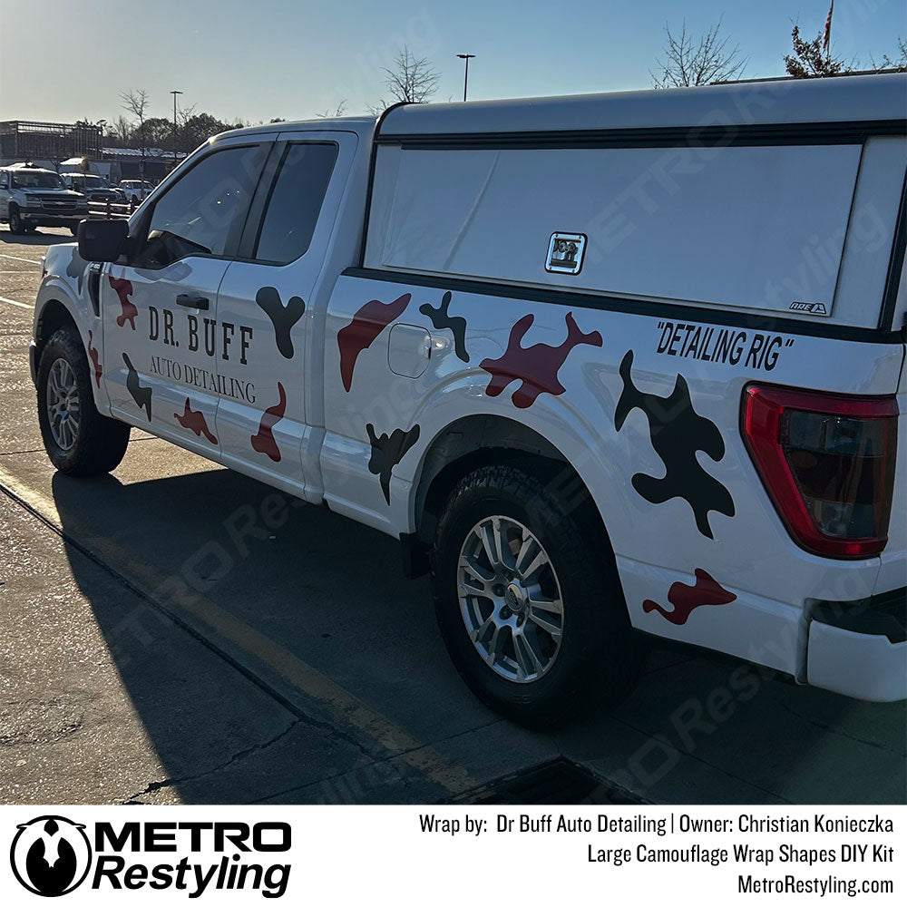 truck with custom camo vinyl wrap