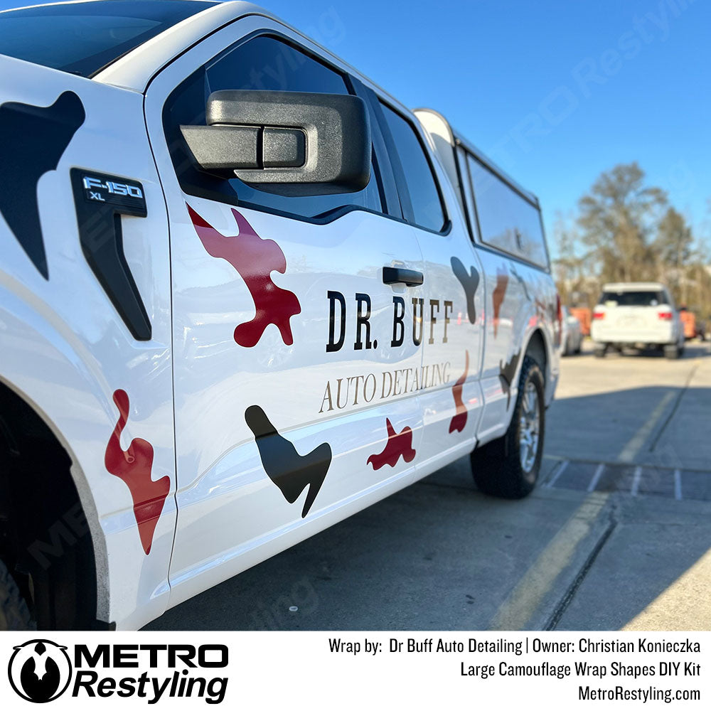 truck with custom camo vinyl wrap