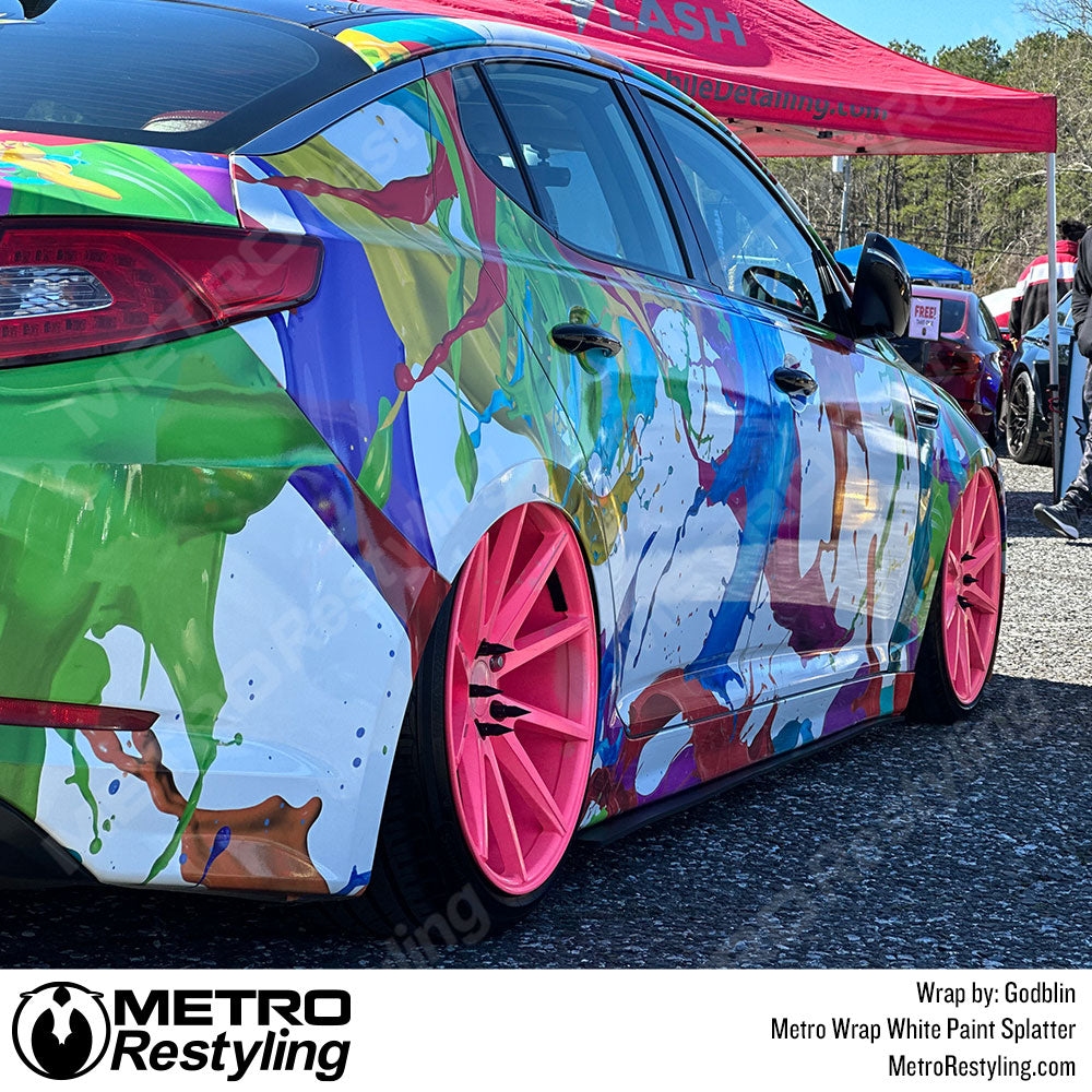 custom paint splatter kia wrap