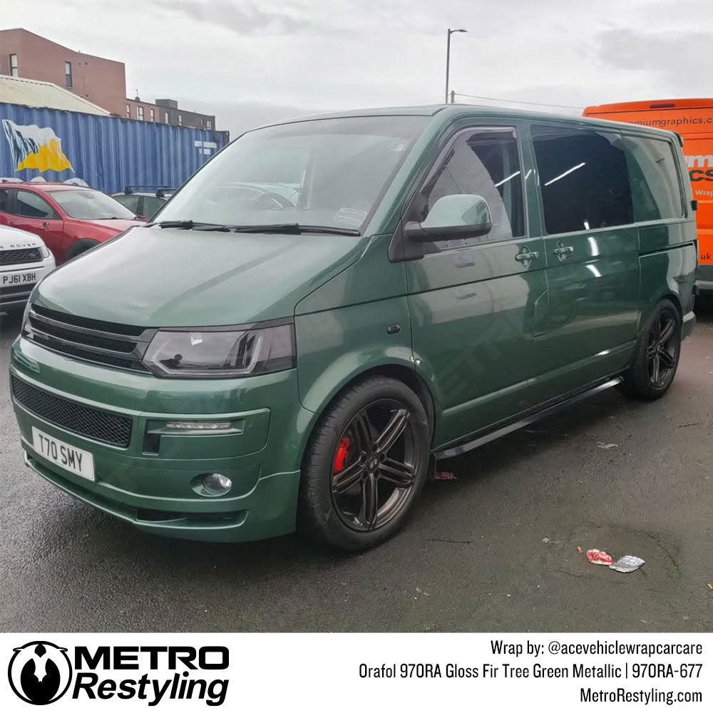 volkswagen van with green wrap