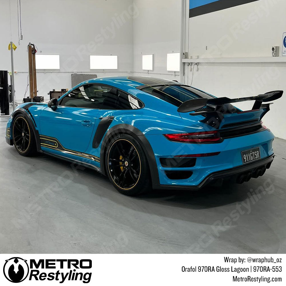 light blue porsche wrap