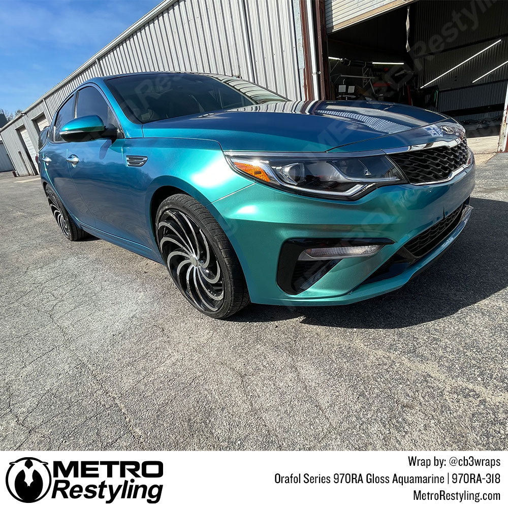 gloss aqua kia wrap