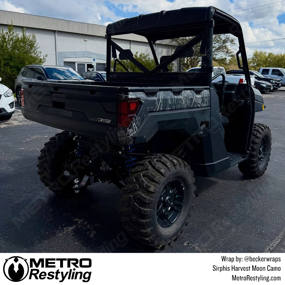 Polaris UTV with black camo wrap