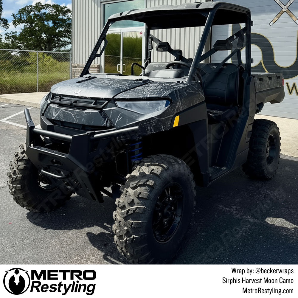 Polaris UTV with black camo wrap