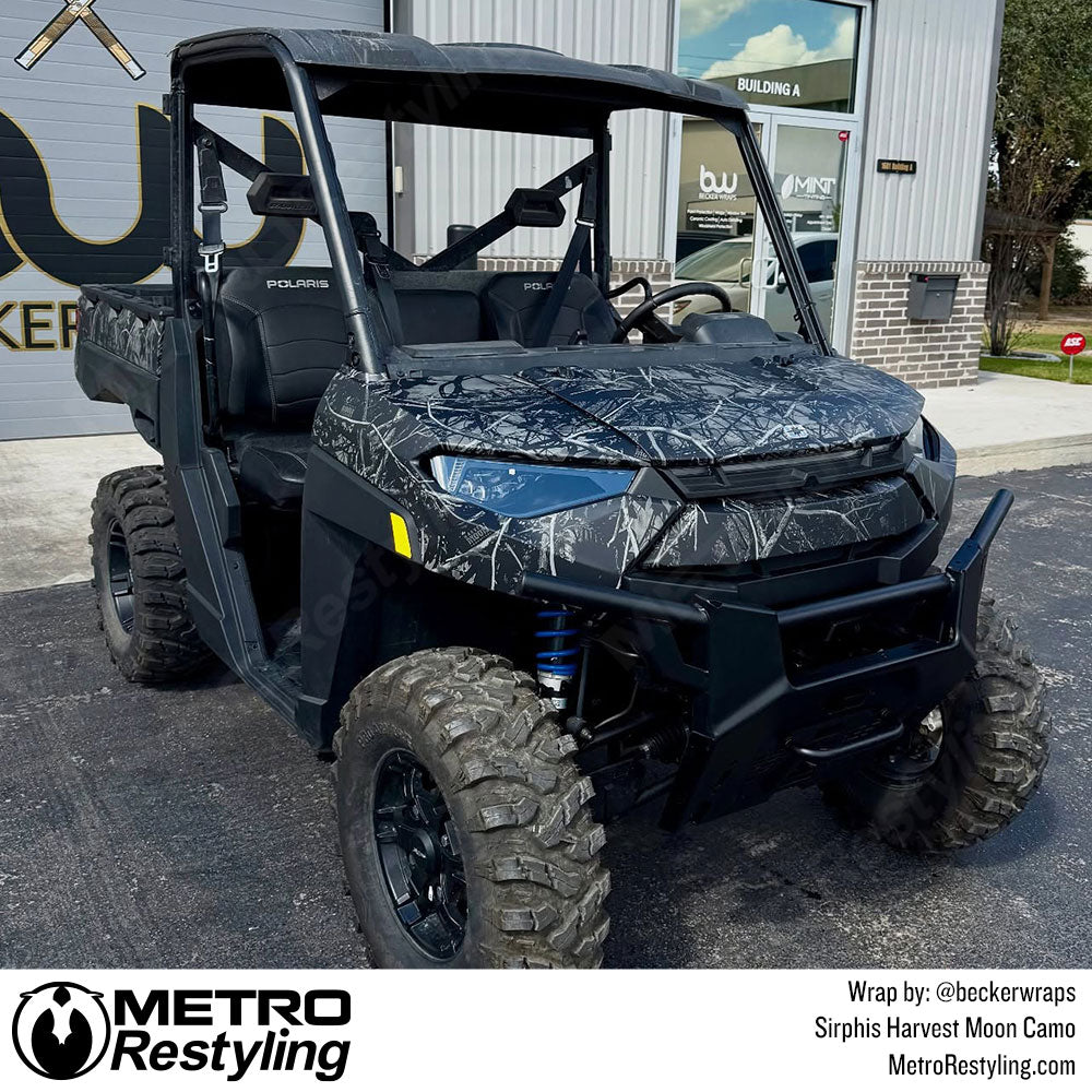 Polaris UTV with black camo wrap