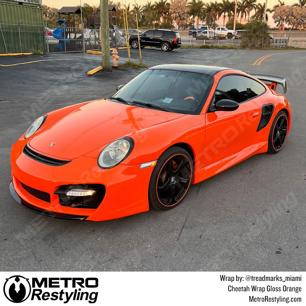 orange porsche vinyl wrap