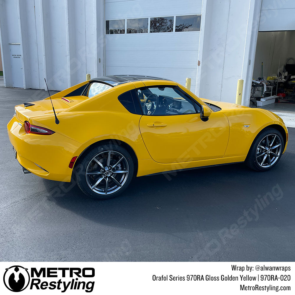 yellow mazda vinyl wrap