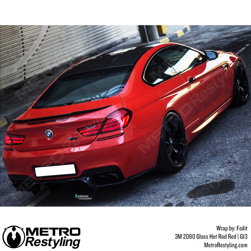 Bright red bmw vinyl wrap