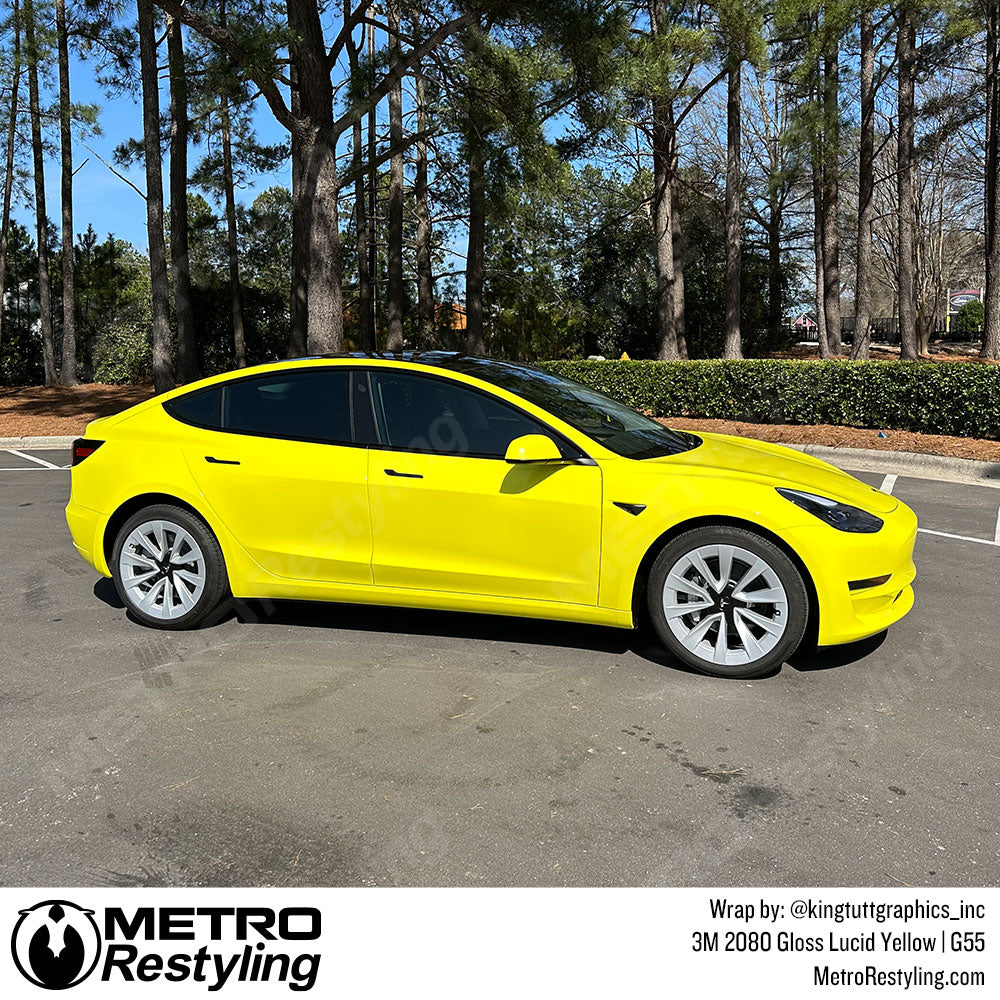 bright yellow tesla wrap