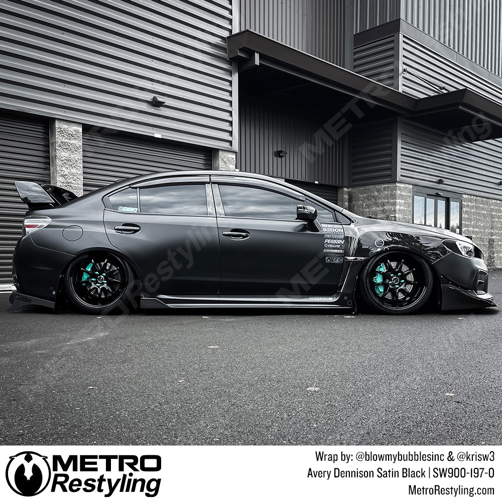 subaru black car wrap
