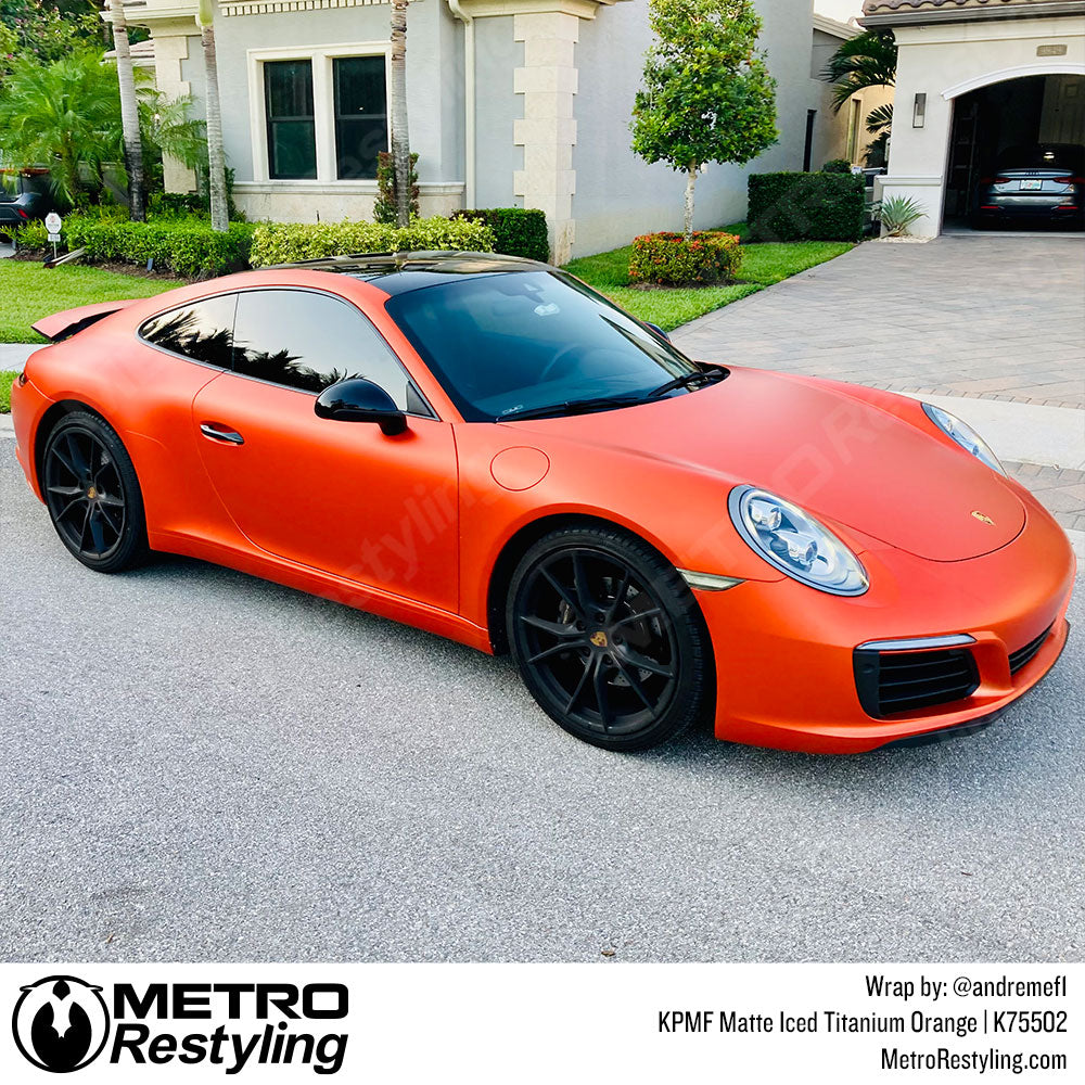 iced titanium orange porsche wrap