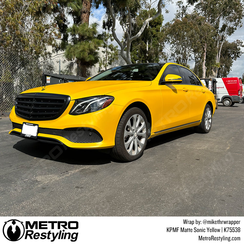 bright yellow mercedes wrap