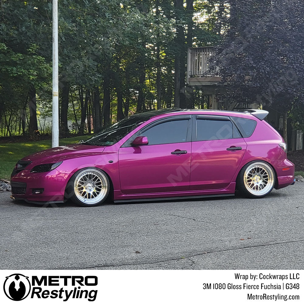 purple vinyl wrapped Mazda