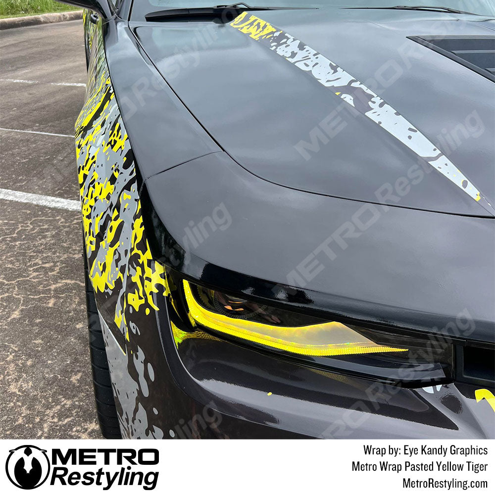 Yellow Pasted camo Vinyl wrapped Chevy Camaro