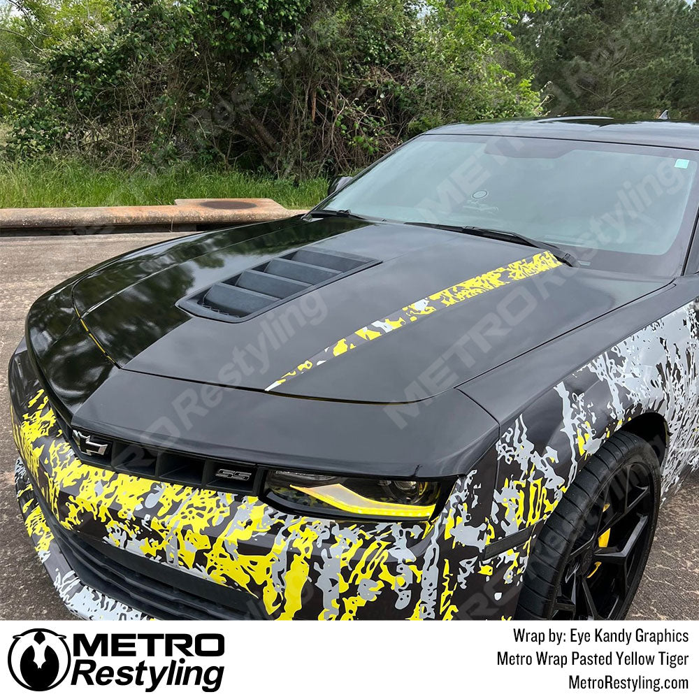 Yellow Pasted camo wrapped camaro