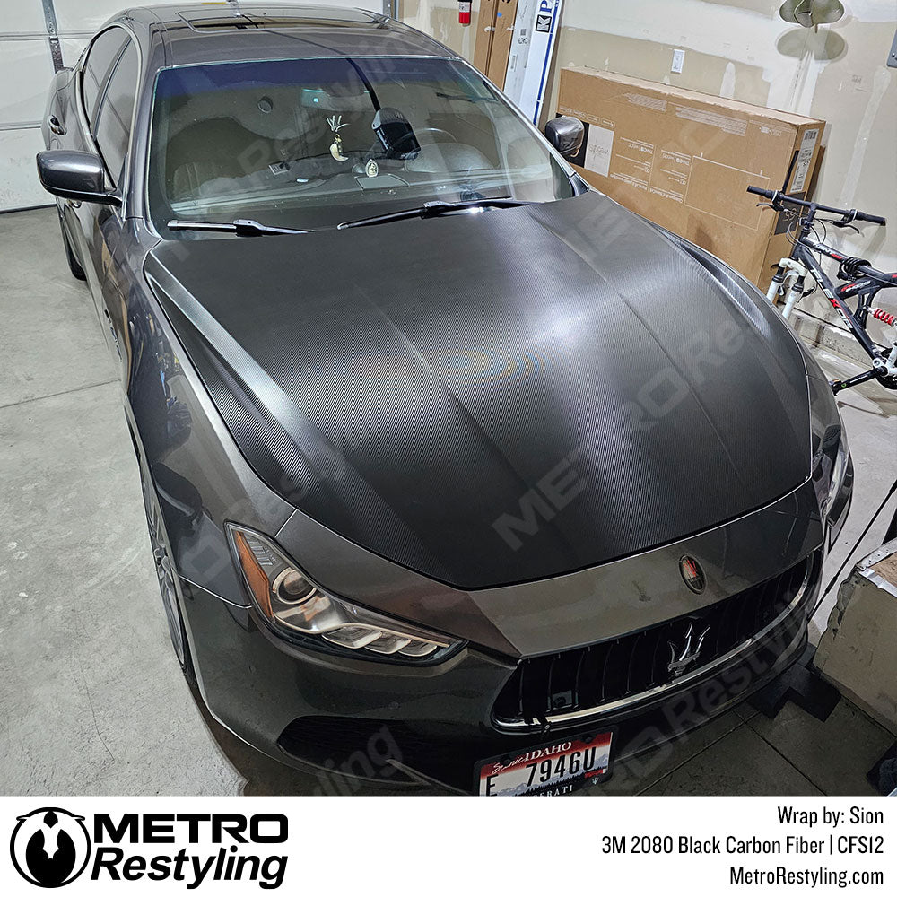 https://metrorestyling.com/cdn/shop/files/MR_33M-2080-Black-Carbon-Fiber_CFS12_Maserati-Ghibli_Wrapped-by-Sion_1024x.jpg?v=1683146818