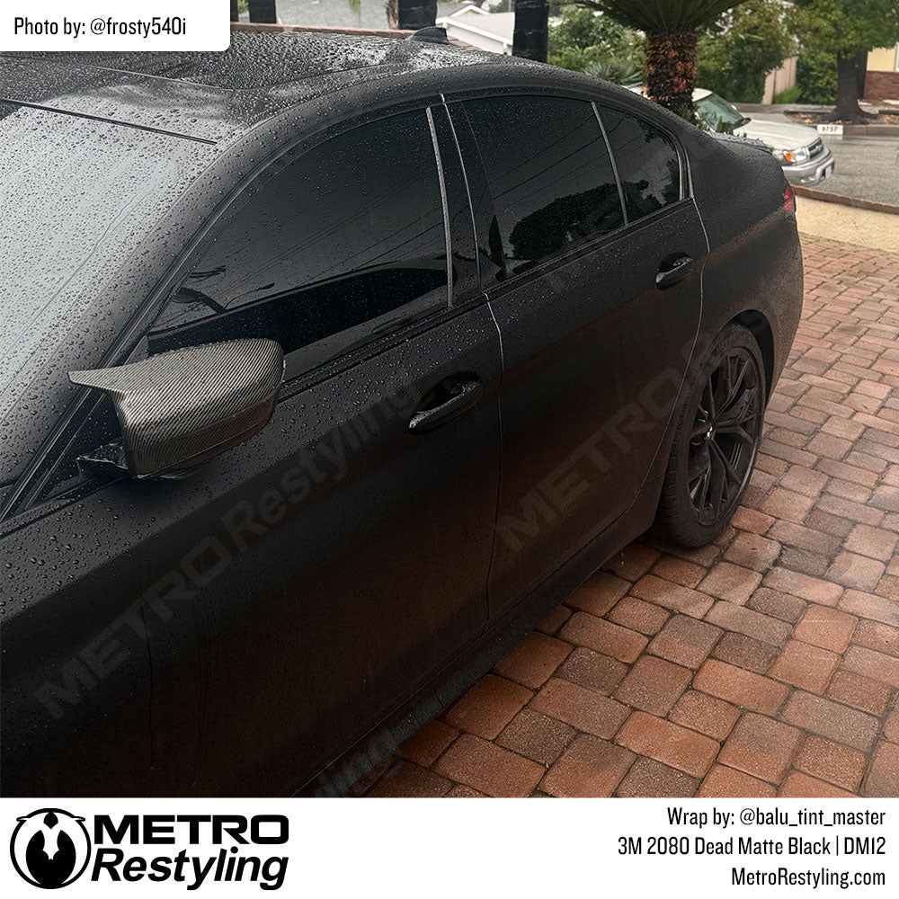 BMW with black vinyl wrap