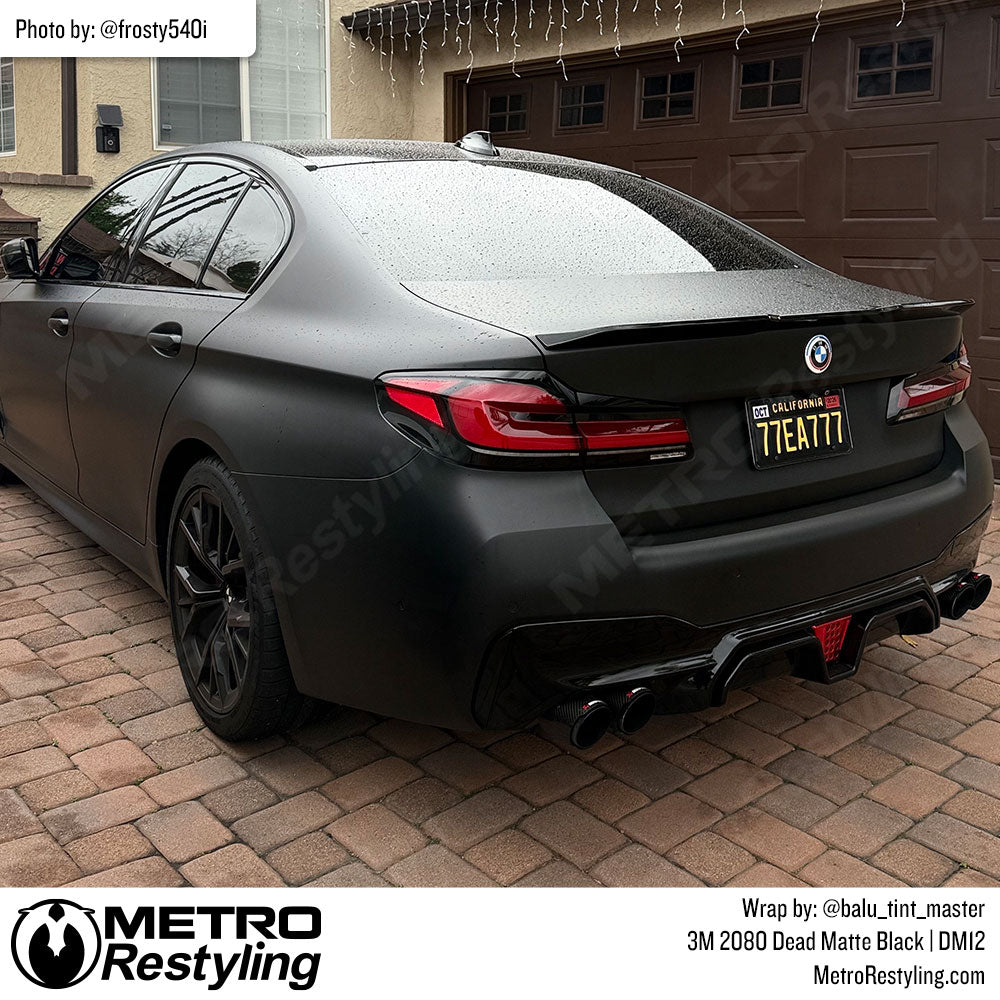 BMW with black vinyl wrap