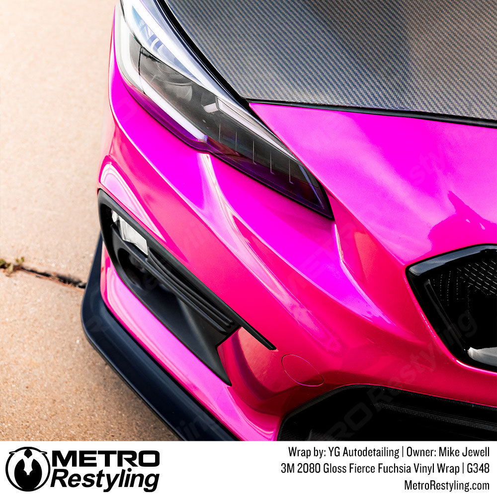 gloss fierce fuchsia vinyl wrap on subaru